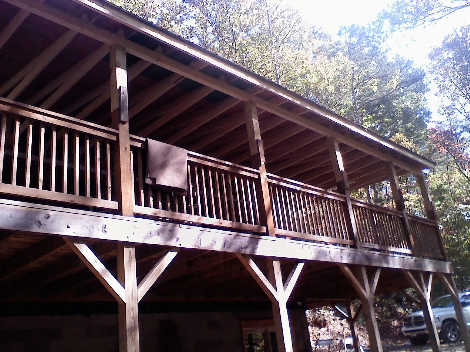 Timber framing under a new elevated porch and deck — Roof Leak Repair in Belleville by Roofing Brothers